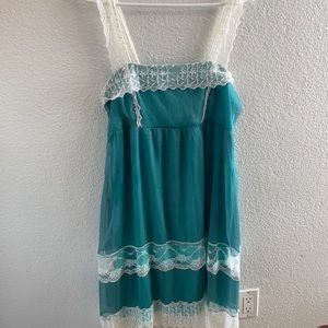 Silk dress in blue greenish  lettuce trim all over dress and very nice color